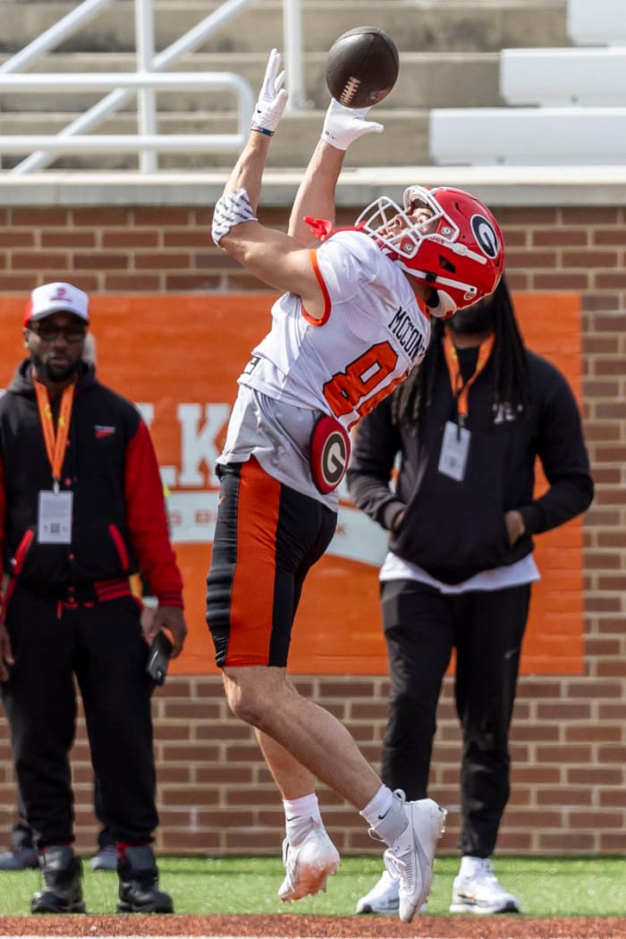 Feb 1, 2024; Mobile, AL, USA; American wide receiver Ladd McConkey of Georgia makes an over the shoulder catch during practice for the American team at Hancock Whitney Stadium. © Vasha Hunt-USA TODAY Sports